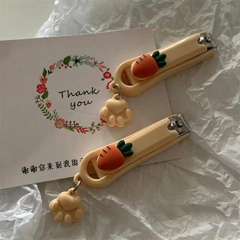 13371048486921702 Adorable Carrot-Shaped Stainless Steel Nail Clippers with Straight Edge Blade - Modern Style Nail Trimmer with Cat Claw Pendant - Unscented, Splash-Proof - Image 1