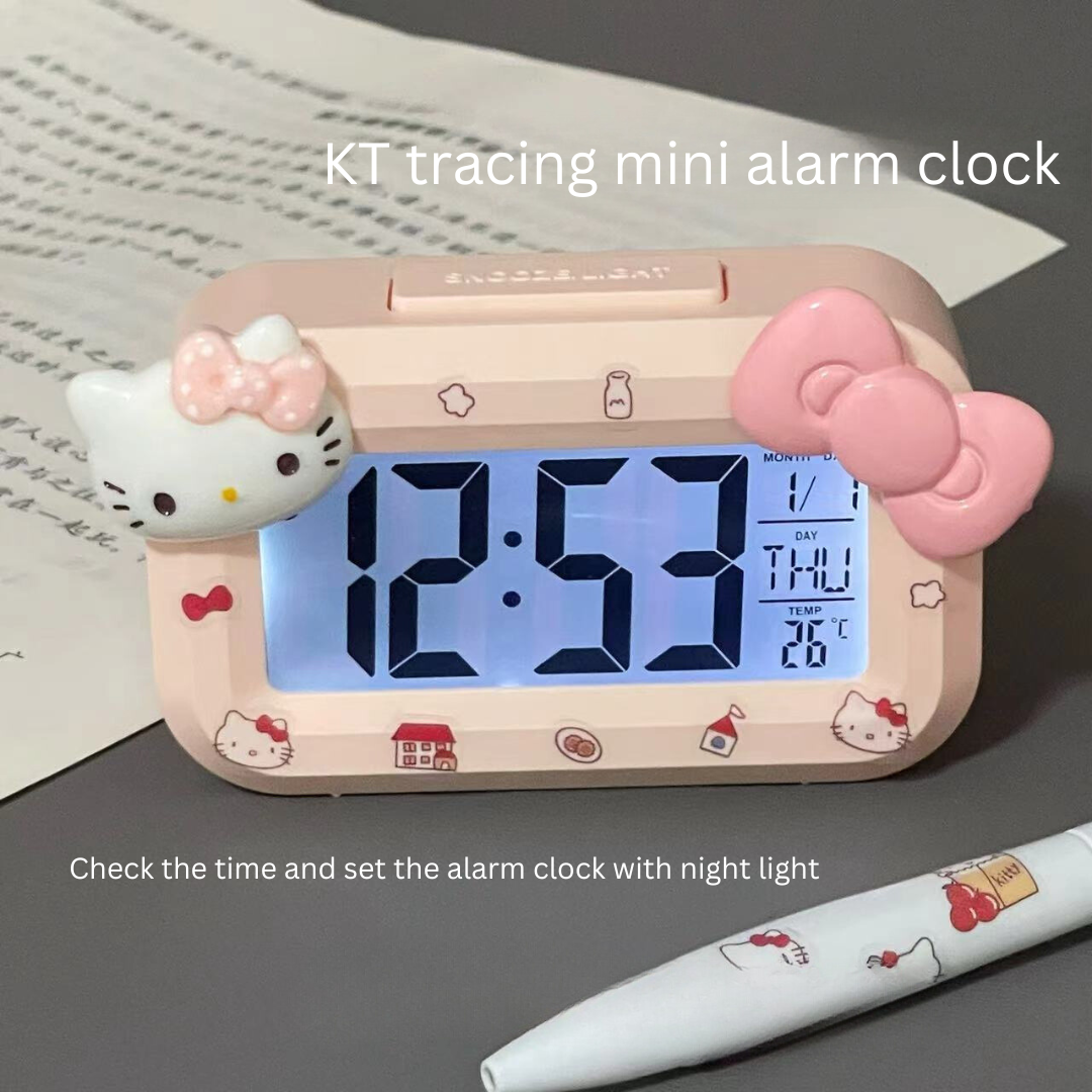 1_c86851cb-4e56-428e-9334-ce5bdfe41f5d Hello Kitty Mini Alarm Clock – Cute Luminous Bedside Clock for Dorms and Students - Image 1