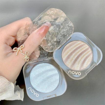 NOVO Highlighter Powder: Shimmer powder for brightening the face, creating a 3D contour, nose shadow, and side shadow. Fine shimmer and pearlescent finish, ideal for contouring.